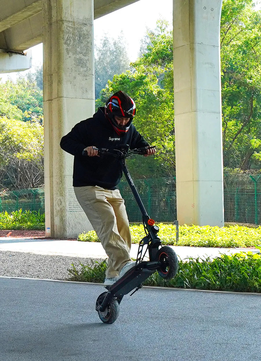 A_man_is_performing_stunts_on_an_Electric-Scooter-IWAFO-IS1