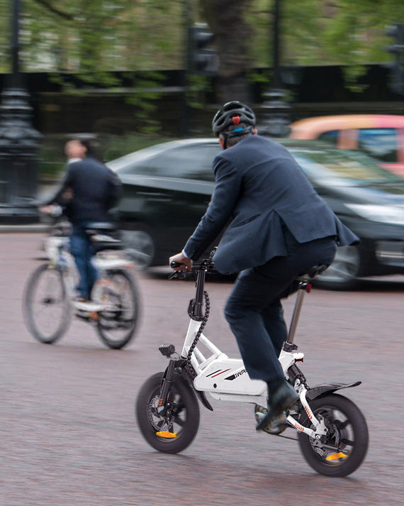 Ride_the_compact_Electric-Bike-IWAFO-IE2_through_the_congested_traffic