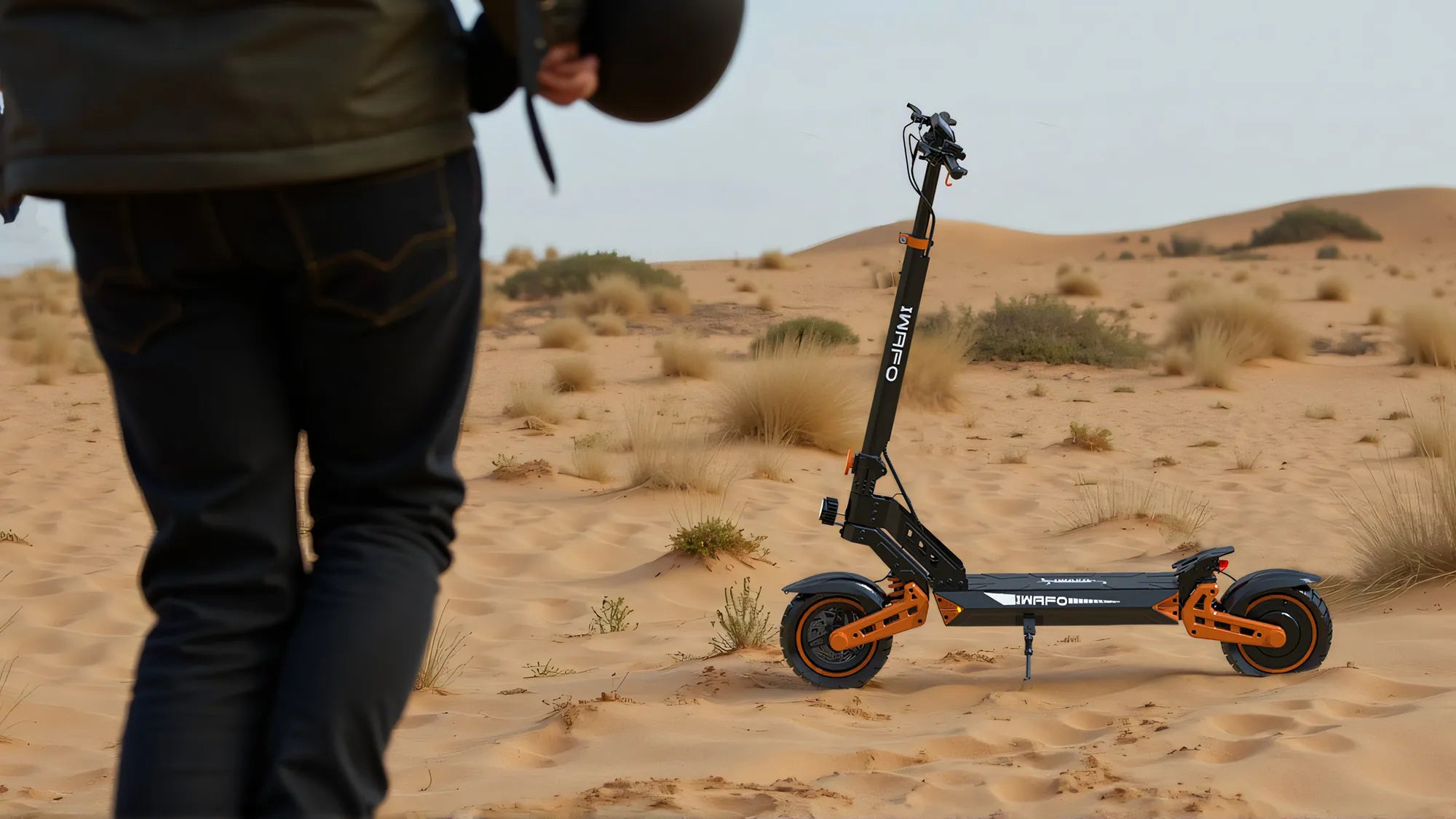 An_artistic_photo_of_a_man_with_his_Electric-Scooter-IWAFO-IS2（1）